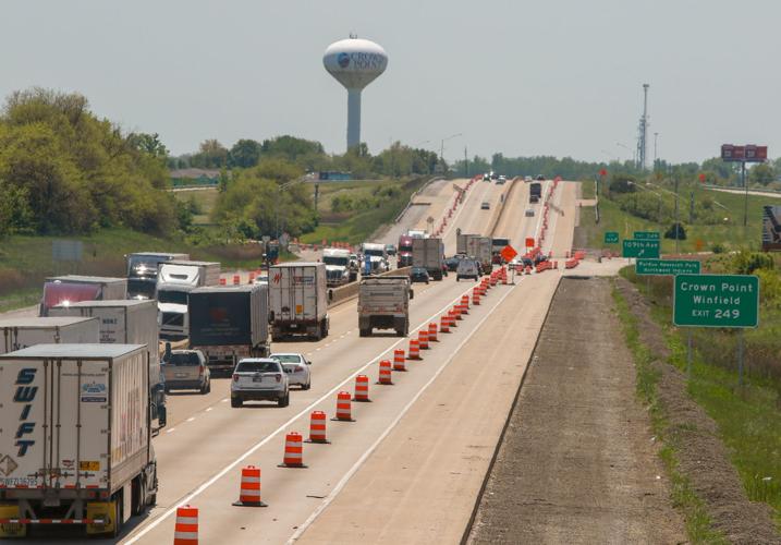 Traffic flows in the lanes of I-65 between U.S. 30 and U.S. 231 during a recent widening project. Legislation approved Monday by the Indiana House would authorize camera enforcement of speed limits in highway work zones. Staff file photo by John J. Watkins