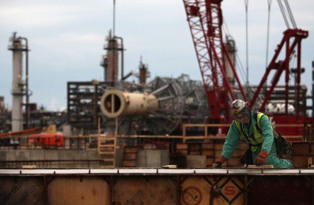 A worker works on a construction project at the BP Whiting Refinery. Heather Eidson | The Times