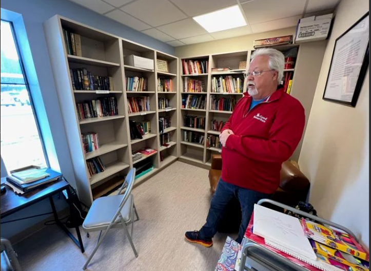 Dave Engstrom, the coordinator for the Wabash Valley Friendship Clubhouse, stands inside the library of the organization’s new, larger facility at 501 S. Sixth St. The Clubhouse serves these living with mental illness. Sun-Commercial photo by Jenny McNeece