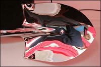 Lt. Gov. Becky Skillman (far right) is reflected in a ceremonial shovel Thursday before a ground breaking ceremony for ASAlliances Biofuel's ethanol plant in Linden. The plant is expected to be operational mid- to late 2007. By Michael Heinz/Journal and Courier