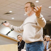Nonsmoker John Long addresses the Greenwood City Council on Monday night before the board approved a smoking ban on a 5-1 vote. PHOTO BY SCOTT ROBERSON