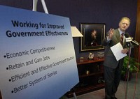 Mayor Graham Richard announces his support Tuesday for the creation of one elected countywide executive and one elected legislative body. He said the unified leadership would help the city and county attract economic development. Dean Musser Jr./The Journal Gazette 