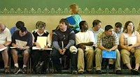 Applicants wait their turn for an interview in the main ballroom at the West Baden Springs Hotel Friday afternoon. Chris Howell | Herald-Times