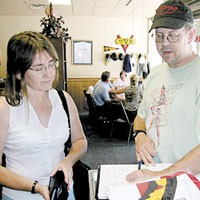 Downtown business owners Cyndi Pote, left, and Brent Bennett join the D &amp; D club on the first day of Franklin’s smoking ban. PHOTO BY PAIGE WASSEL
