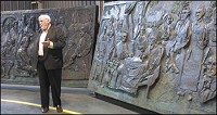 Brian Bex, founder of The Remnant Trust, introduced the Timeline of Liberty in a 2004 press conference. The 6-ton, three panel, bronze sculpture was installed in Warder Park Wednesday and we be unveiled in conjunction with the restored Carnegie Library on Oct. 25. Staff photo by C.E. Branham