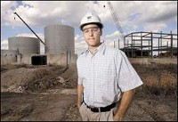 READY TO BUILD - Central Indiana Ethanol general manager Mitch Miller stands in front of the ethanol plant that's under construction on Ind. 18 west of Marion. JEFF MOREHEAD / jmorehea@marion.gannett.com