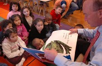 Gov. Mitch Daniels reads to students in all-day kindergarten at Abbett Elementary School in Fort Wayne. Photo by Dean Musser Jr./Journal Gazette