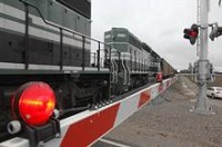 Engines for the Evansville Western Railway pull 80 coal cars over Tile Factory Road in Mount Vernon, Ind., on the way Illinois to be loaded with coal. With several ethanol plants planned in the area, the future looks good for the young business. Photo by Bob Gwaltney