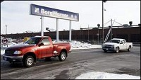 A truck drives away from the BorgWarner plant in Muncie on Wednesday during a shift change. Officials announced on Thursday that the local plant would close no later than April 2009. KYLE EVENS / THE STAR PRESS