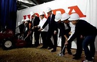 Officials from Governor Mitch Daniels, to American Honda president Yuzo Uenohara gathered with hundreds of guests and Honda associates to break ground at the already bustling Honda manufacturing plant in Greensburg today. Photo by Joe Harpring