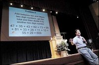 MATH WHIZ - Mathematician Mike Byster demonstrates his mental quickness by answering a difficult equation in seconds during Synergy '07 at Indiana Wesleyan University's Phillippe Performing Arts Center. Byster travels the country encouraging kids to think creatively and find patterns to help them learn more. JEFF MOREHEAD / jmorehea@marion.gannett.com