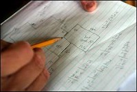 Mount Pleasant Township Assessor Deborah Crosley adds up the measurements she took of a house in Yorktown. Melanie Maxwell / The Star Press