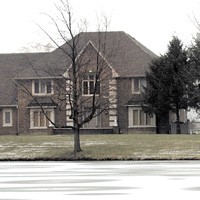 Prosecutors have accused Robert Nelms and Debora Johnson-Nelms of using money taken from a cemetery trust to pay closing costs on their house on Curry Road in the Center Grove area. PHOTO BY SCOTT ROBERSON