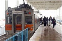 Passengers emerge from a South Shore train at South Bend Regional Airport. The Indiana House passed a bill this week that would shorten the commute to Chicago and add rail lines that would connect to the main line, serving new commuters in northwest Indiana. Tribune File Photo/PAUL RAKESTRAW