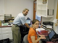 James Nelson Gingerich (founder and medical director) and (R) Amy Crosson (nurse) at The Hub. Maple City Health Care Center switched to an electronic medical records system last year. All of our providers use laptops to see and change patient files. We`re very proud of our system since it helps us provide better care for less money.