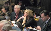 State Rep. Suzanne Crouch, R-Evansville, center, listens intently to debate on bills in the Indiana House on Thursday. At left are state Rep. Kathy Richardson, R-Noblesville, and state Rep. Robert Behning, R-Indianapolis. At right is state Rep. Matt Bell, R-Avilla. Thursday was the deadline for the House to vote on Senate bills. BRYAN CORBIN / Evansville Courier &amp; Press