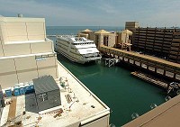 The roof of the new Horseshoe casino boat, still under construction (left), has thermal-reflective white paint that is a higher energy efficiency.&nbsp;(Stephanie Dowell/Post-Tribune)