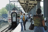 South Shore riders wait on a platform Monday in Hammond. Rising gasoline prices have boosted the use of public transportation nationwide, but the picture in the region is more of a mixed bag. While weekend and holiday ridership on the South Shore is up 6.6 percent so far this year compared with 2007, overall ridership is down 0.6 percent. Tony V. Martin, Times of Northwest Indiana
