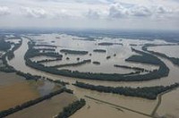 This picture, taken Saturday, shows the White River with its boundaries extended between Hazleton, Ind., and where it meets with the Wabash River near Mount Carmel, Ill. Photo by Denny Simmons