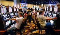 The Hoosier Park casino in Anderson opened to hundreds of people ready to try out one of the 2,000 electronic slot machines in this file photo from June 2, 2008. John P. Cleary / The Herald Bulletin
