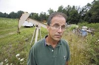 Rising oil and natural gas prices are prompting Tom Young to reopen a couple of wells in LaPorte County. State officials say interest in oil and natural gas exploration has risen along with oil and natural gas prices. GREGG GEARHART | THE TIMES