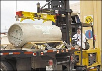 That does it: The last canister of VX nerve agent is unloaded Monday at the Newport Chemical Depot.