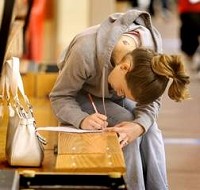 &nbsp;
Karen Crowder, 22, of Osceola, fills out an application for a health care position during U.S. Sen. Evan Bayh's 6th Annual Job Fair on Wednesday at IUSB. Tribune Photos/JIM RIDER