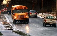 Several motorists find icy Riverside Avenue tough to maneuver early Friday morning. City salt trucks salted the hill around 9 a.m. (KYLE EVENS / THE STAR PRESS)