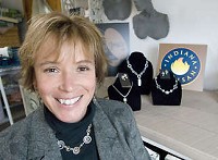 AMY GREELY has been making jewelry in her Nashville studio for the past eight years. She is wearing a necklace and earrings that she made. David Snodgress | Herald-Times