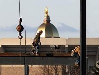 With the Golden Dome and Notre Dame Stadium looming in the background, construction continues on Innovation Park at Notre Dame, the research park being developed on Edison Road. Tribune photo/JIM RIDER