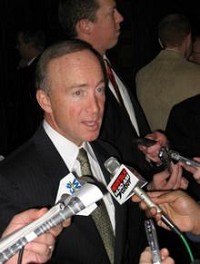 Indiana Gov. Mitch Daniels speaks to reporters Tuesday following his speech to the Indianapolis Rotary Club where he discussed the highlights of his proposal for the next state government budget. Daniels proposes maintaining K-12 education at essentially current levels, with cuts elsewhere. BRYAN CORBIN / Courier &amp; Press