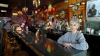 Edna Heckber has worked at Acme Bar for 30 years. The tavern and liquor store will close at 1 a.m. Sunday. Samuel Hoffman | The Journal Gazette