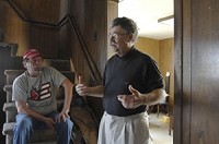 Denny Peak (right) talks with a reporter in a home in Goshen he shares with Jerry Tyson (left) and three other homeless men. Truth Photo By J. Tyler Klassen