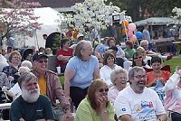 ORLEANS — The crowd enjoys the humorous banter of a gospel group that performed Wednesday evening at the Orleans Dogwood Festival. Times-Mail / GARET COBB