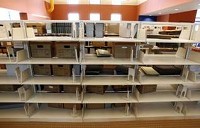 An empty shelf at the Genealogy Center for the move into Carnegie Library. The library will now house the genealogy materials and a computer lab. (Chris Bergin / THE&#8200;STAR&#8200;PRESS)