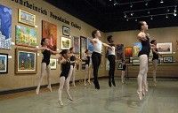 Members of the Evansville Dance Theatre give a demonstration as part of the Brown Bag Performing Arts Series in the Bower-Suhrheinich Gallery of the Arts Council of Southwestern Indiana. They also danced four short pieces before the crowded gallery. BOB GWALTNEY / Courier &amp; Press