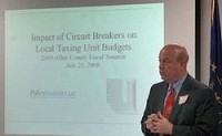 Todd Samuelson, a certified public accountant with H.J. Umbaugh &amp; Associates, explains the impact of circuit-breaker tax credits during last week’s Allen County Fiscal Summit. Schools and other local taxing units will lose $4.7 million in revenue to the tax caps this year; about $29 million in 2011. Dean Musser Jr. | The Journal Gazette