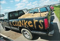 A pickup truck sits in the Wiese parking lot. The owners spray-painted “Cash 4 Clunkers” on the vehicle. JOEL PHILIPPSEN | THE REPUBLIC