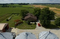 The homestead of Larry Schwiersch, a Gibson County, Ind., farmer, will have Interstate 69 passing in front of his family's home. Construction is ongoing on the newest section of the highway, seen in the upper right. The land was purchased by the state in 2009. DENNY SIMMONS / Courier &amp; Press