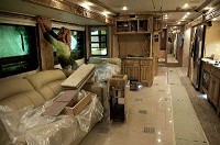 Chris Bahrke wires the interior of an American Heritage model RV at the Fleetwood RV plant in Decatur.