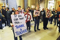 Pam Craft, a fifth grade teacher from the Culver School corporation, listens to activities in the Indiana Senate Tuesday afternoon. Jim Avelis, Herald Bulletin photo