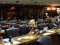 Indiana State Rep. Terri Austin, a Democrat from Anderson, is surrounded by empty seats vacated by fellow House Democrats, who fled the state in a walkout to stall GOP-backed legislation. Maureen Hayden photo