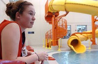 Danie Hoffmann, a junior nursing student at Ball State, life guards part time to help pay for school and avoid crushing loans and is seen in a life guard chair Thursday, May 26, 2011, in Valparaiso, Ind. | Scott M. Bort~Sun-Times Media