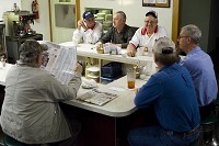 The &ldquo;Horseshoe Club&rdquo; &mdash; named for the shape of the bar at which they regularly sit &mdash; at Windell&rsquo;s Caf&eacute; in Dale includes Jerry Sanders of Santa Claus, clockwise from top left, Ray Striegel of Dale, Ray Harpenau of St. Henry and Jack Troth, Bob Reinke and Gerald Spurlock, all of Dale. At about 5:30 a.m. Thursday, the men enjoyed some of the final cups of coffee being served at Windell&rsquo;s. The caf&eacute; opened in 1947 and Betty and Darrel Jenkins, owners for the past 20 years, are closing it Sunday. Jake May/The Herald