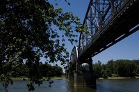 Closed in May, the New Harmony Bridge which links New Harmony, Ind., with White County, Ill., as it crosses the Wabash River only serves nesting swallows, wasps and pigeons these days. Staff photo by Denny Simmons