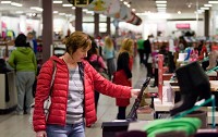 LaPorte resident Deb Varnak looks at shoes inside JCPenney at Westfield Southlake Mall in Hobart on Black Friday. Retail and food sales will be the first NWI Index component to be hurt if angst about the nation's economy translates into lower levels of spending, Indiana University Northwest professor Micah Pollak said. Staff photo by Jon L. Hendricks