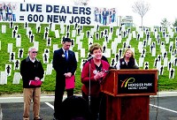 From left: State Sen. Tim Lanane (D-Anderson), State Reps. Sean Eberhart (R-Shelbyville) and Jean Leising (R-Oldenburg), and State Rep. Terri Austin speak at a press conference in support of adding live dealers at Indiana's two racinos. Staff photo by Baylee Pulliam