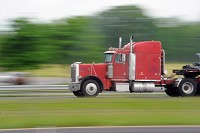 A truck travels near Seymour on Thursday. A wheel tax could greatly affect those in the transportation industry in the area. Staff photo by Aaron Piper