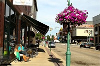 Lisa Marie Smith and Christina Vendely hang out at a downtown coffee shop in Noblesville. Staff photo by Tim Bath