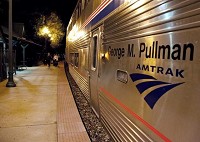 Passengers deboard the Hoosier State Amtrak train on Wednesday at the depot in Lafayette. / Brent Drinkut/J&amp;C